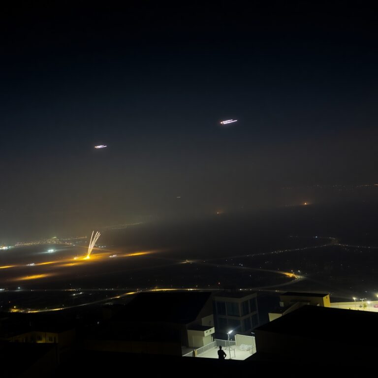 Flux_Schnell_A_night_scene_over_Doha_Qatar_showing_distant_mis_1